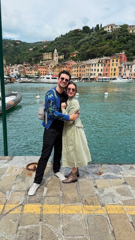 Morgan and Spencer at a colorful Italian harbor